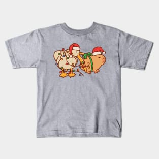 Pelican eats capybara, Merry Christmas, lights and red hat Kids T-Shirt